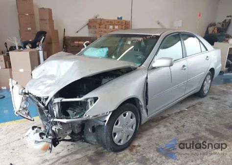 2003 Toyota Camry Le from USA, damaged, VIN 4T1BE32K13U118223